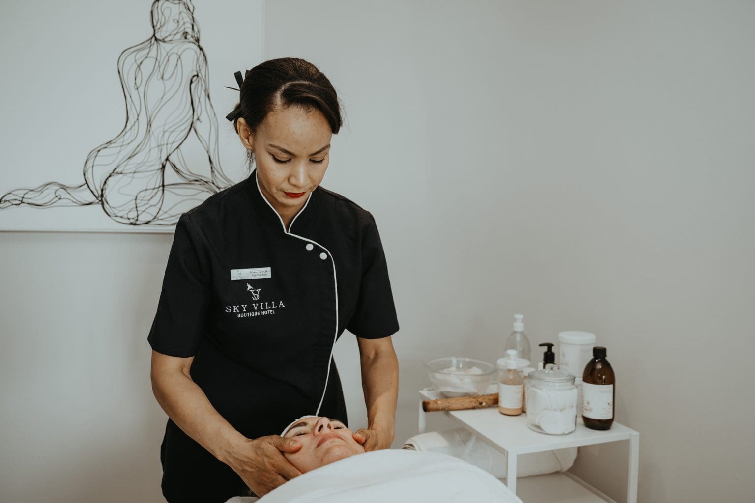 lady giving spa treatments at sky villa