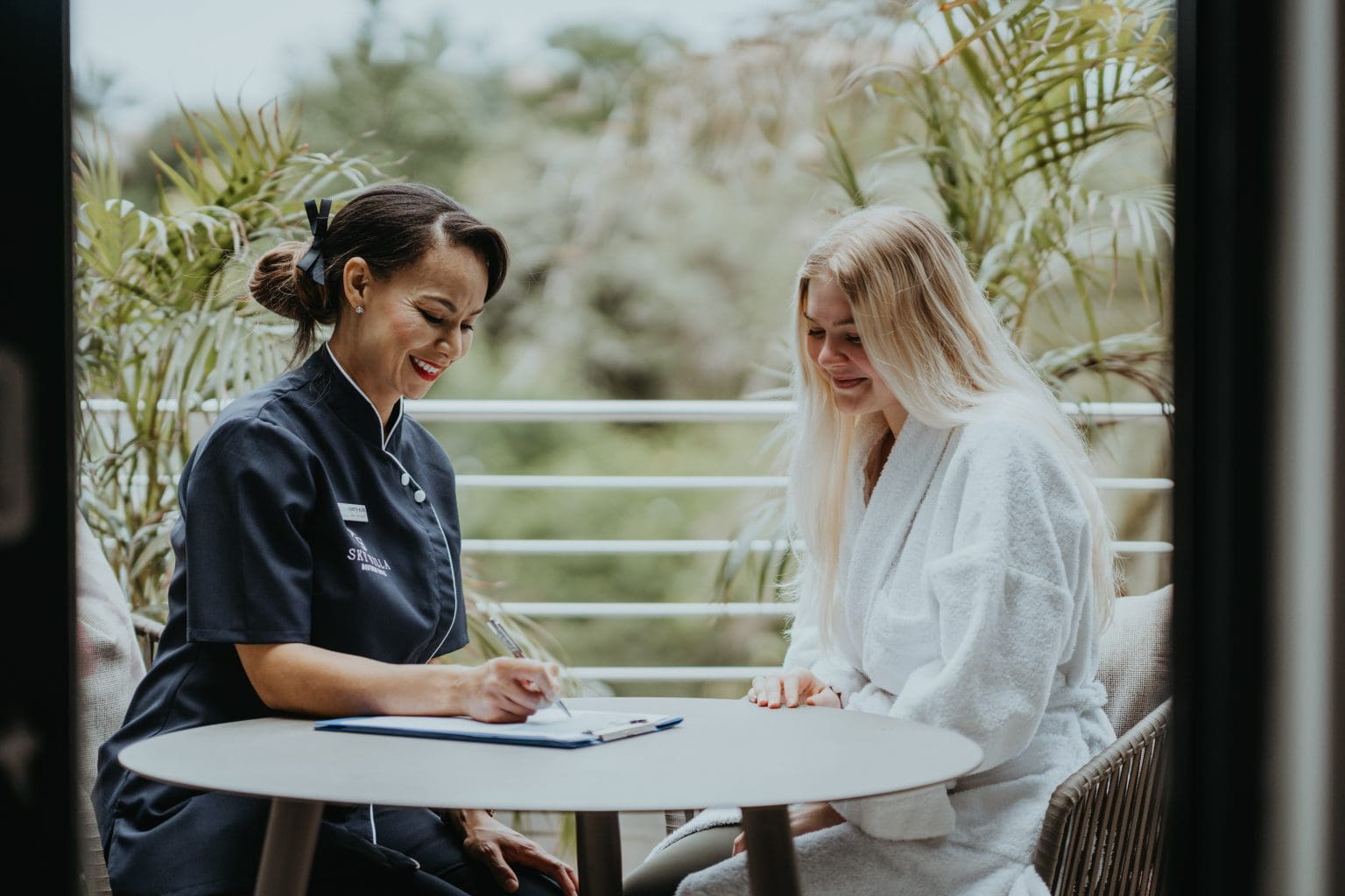 lorette boer spa therapist with client